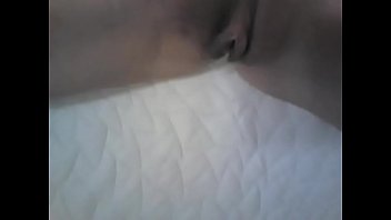 Greek woman massages clitoris with her hand to orgasm